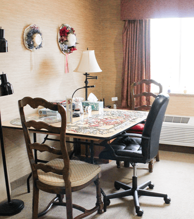 Cozy common area with a dining table and decorative elements