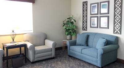 Cozy common area with seating and plants