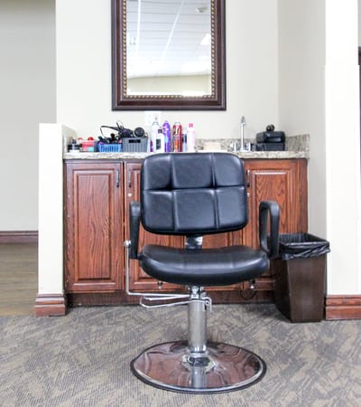 Hair salon chair in a facility interior
