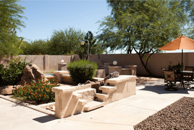 Outdoor space with a seating area and landscaping