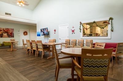 Interior common area with tables and chairs