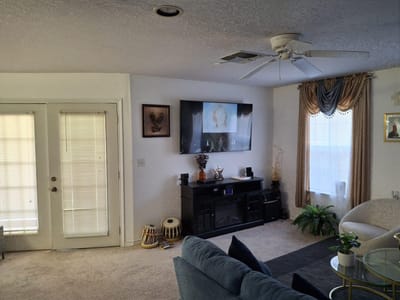 Cozy interior common area with seating and decor.