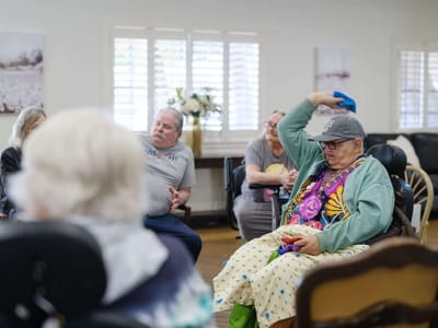 Residents engaging in a group activity in a common area