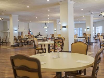 Bright dining room with tables and chairs