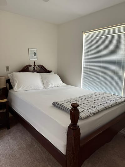 Cozy bedroom with a neatly made bed