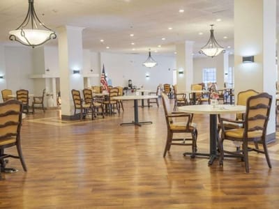 Bright dining area with tables and chairs