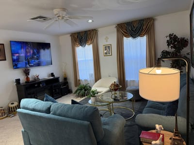 Cozy common area with comfortable seating and a TV