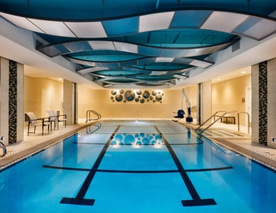 Indoor swimming pool with artistic ceiling design