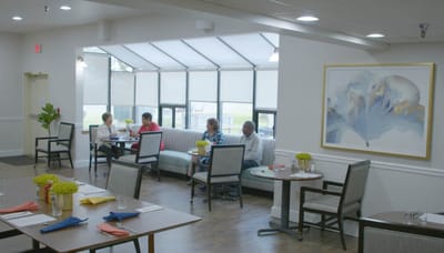 Residents enjoying conversation in a common area