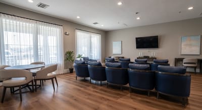 Interior common area with seating and windows