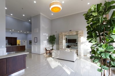 Bright and spacious common area with seating and natural light