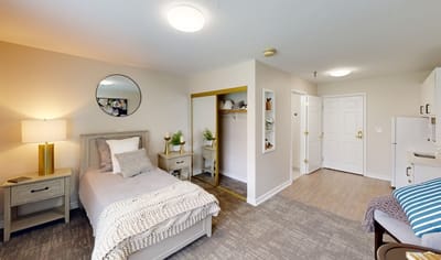 Bright and cozy resident room with furnishings