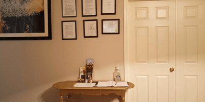 Interior space with documents and a painting on the wall