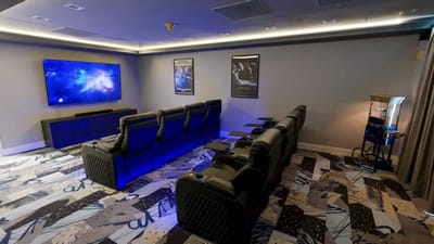 Interior view of a movie theater room with seating