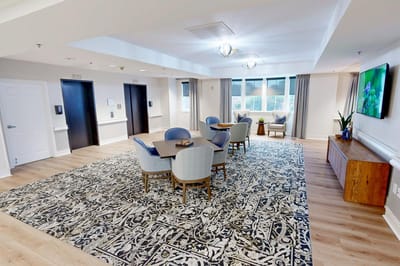 Bright common area with seating and décor