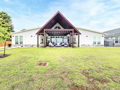 Exterior view of the facility with outdoor seating