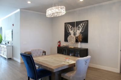 Interior view of a common area with a table and chairs