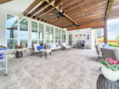 Outdoor patio area with seating and decor