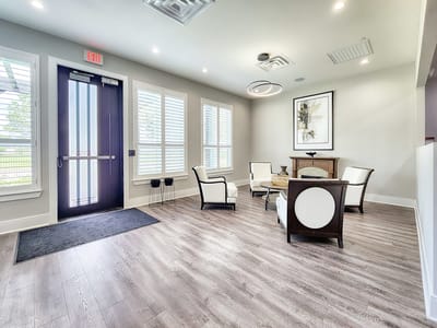Welcoming lobby area with seating and natural light