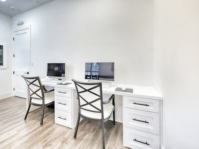 Bright interior workspace with computers and clean design