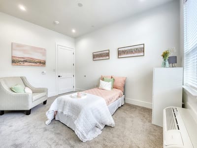 Cozy private resident room with light decor
