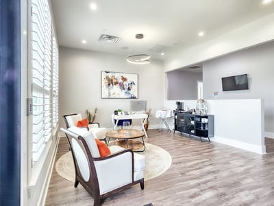 Bright interior of a common area with seating and decor