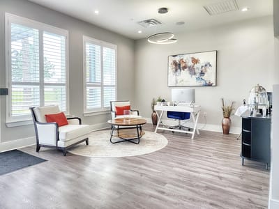 Bright common area with seating and decor