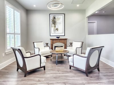 Common area with seating and decorative art