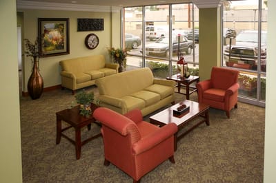 Common area with seating and large windows