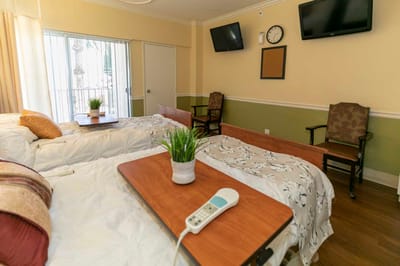 Interior view of a shared resident room with beds