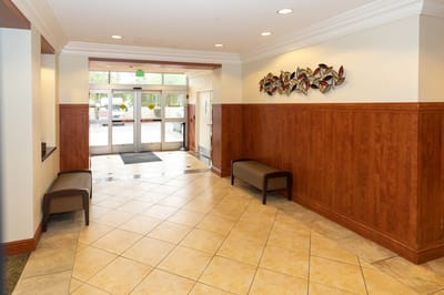 Interior view of a lobby with seating and art