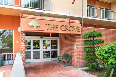 Front entrance of The Grove with signage