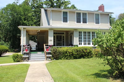 Exterior view of a residential-style building with porch