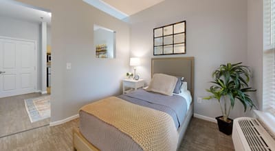 Cozy private bedroom in a senior living facility