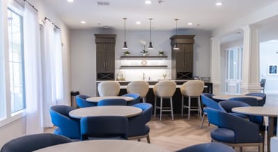 Bright common area with seating and countertop