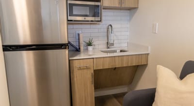 Well-equipped kitchenette in an assisted living unit