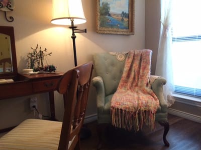 Cozy seating area with a colorful blanket