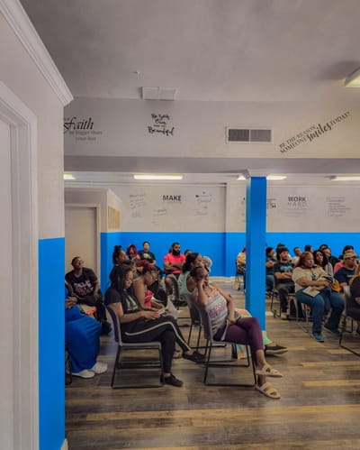 Group of people sitting in a common area