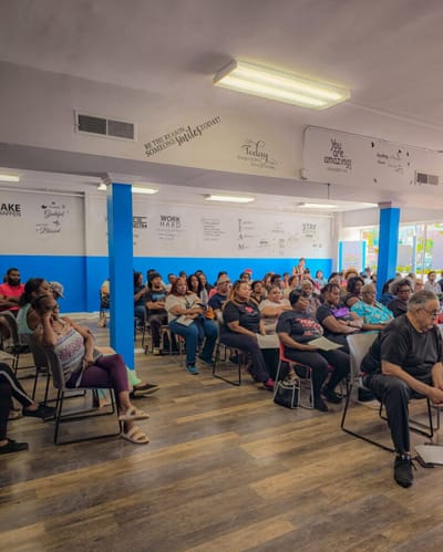 Group of people seated in a common area