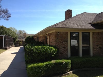 Exterior view of a nursing facility building.
