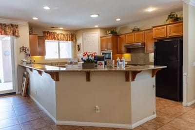 Well-lit kitchen with modern appliances