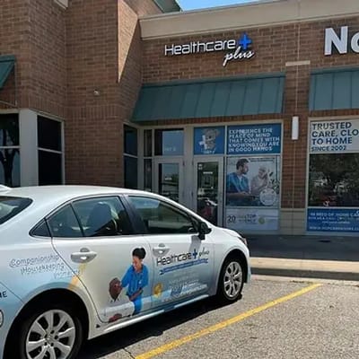 Healthcare Plus Caregivers vehicle outside facility