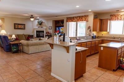 Spacious common area with a living room and kitchen