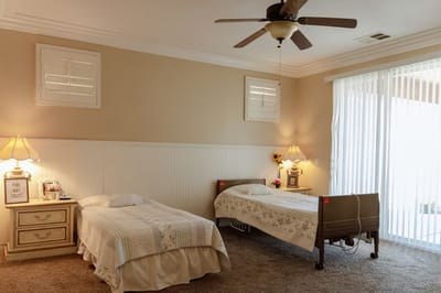 Cozy shared resident room with two beds.