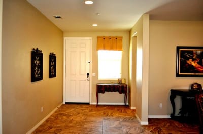 Interior hallway with door and decorative items