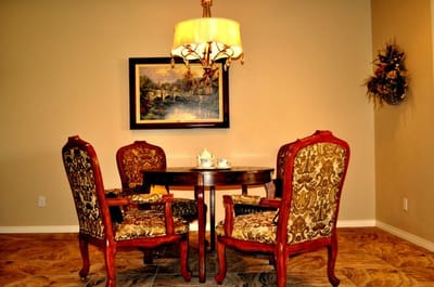 Cozy common area with a small table and chairs
