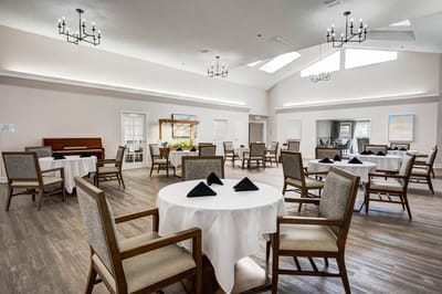 Dining area with set tables and chairs