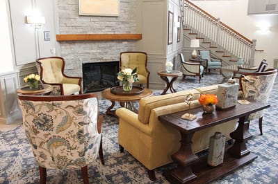 Common area with seating and a fireplace
