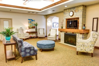 Comfortable common area with seating and a fireplace