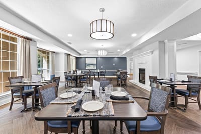 Dining room set up with tables and chairs
